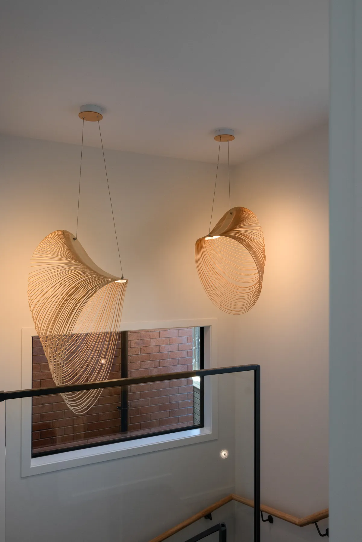 Sculptural stairwell pendants